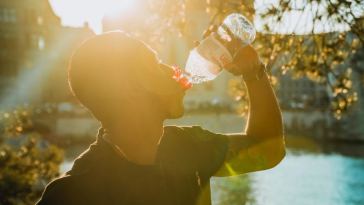 man drinking water