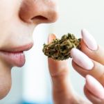 woman smelling weed